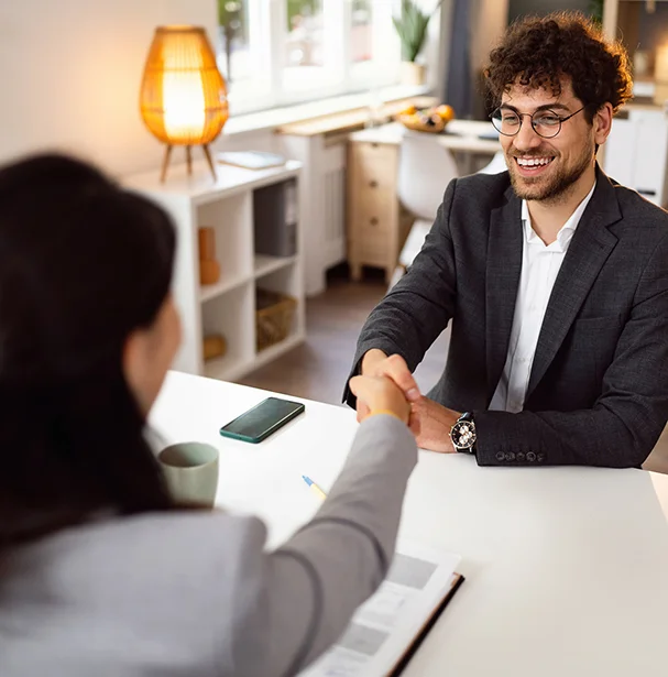 Handshake between a job seeker and employer.